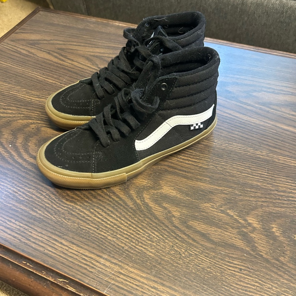 Vans Black and White High-Top Sneakers